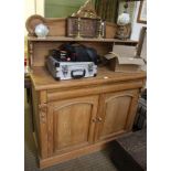 A LATE 19TH CENTURY PINE CHIFFONIER SIDEBOARD having fancy upstand with single shelf, the base