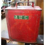 A RED PAINTED PETROL CAN