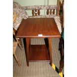 A MAHOGANY SQUARE TOPPED OCCASIONAL TABLE on four splayed, united by a solid undertier