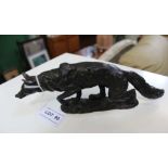 A 20TH CENTURY CAST BRONZE STALKING FOX, on ground work base, 21cm long