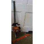 A STIHL BRANDED PETROL DRIVEN HEDGE CUTTER model HS45