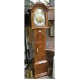 A WELL MADE REPRODUCTION WALNUT FINISHED GRANDMOTHER SIZED LONGCASE CLOCK, by 'Comitti of London'