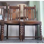 A SET OF SIX 20TH CENTURY OAK DINING CHAIRS, with decorative backs and drop-in seats