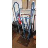 A BLUE FINISHED SACK TRUCK having rotating wheel device for the ascending and descending of stair
