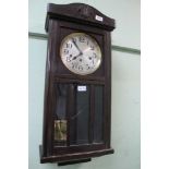 A 20TH CENTURY OAK FINISHED VIENESE STYLE HANGING WALL CLOCK