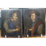 A PAIR OF PAINTED PORTRAIT WOODEN PLAQUES, probably Dutch, on softwood panels