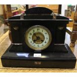 A CARVED SLATE MANTEL CLOCK