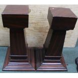 TWO WOOD EFFECT DISPLAY PEDESTALS together with a velvet lined box