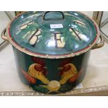 A DECORATIVELY PAINTED TIN CIRCULAR LIDDED BREAD CROCK, decorated with chickens and eggs