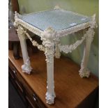 A LATER PAINTED GESSO DECORATED FOUR LEGGED OCCASIONAL TABLE