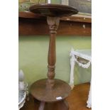 AN OAK SAUCER TOPPED STAND on turned column