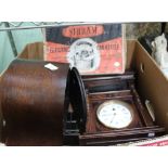 A BOX CONTAINING TWO WOODEN CASED CLOCKS together with a boxed Sirram car kettle