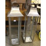 A PAIR OF MODERN FLOOR STANDING CANDLE LANTERNS