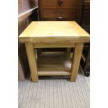 A MODERN OAK BLOCK BUILT SQUARE FORMED TWO-TIER TABLE
