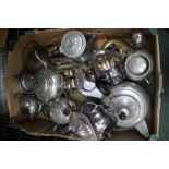 A BOX CONTAINING A SELECTION OF DOMESTIC METALWARES the majority for the tabletop