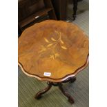 A PROBABLE ITALIAN INLAID INVERT PIECRUST EDGED OCCASIONAL TABLE on turned column and four fancy