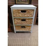 A PAINTED CHEST CONTAINING THREE WOVEN DRAWERS