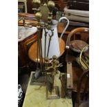 A WORK TOP MANGLE together with a series of fireside tools, and a large tin jug