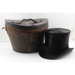 A 'THOMAS TOWNEND & CO.' LONDON SILK TOP HAT, in leather hat case (internal dimensions of hat; 19.