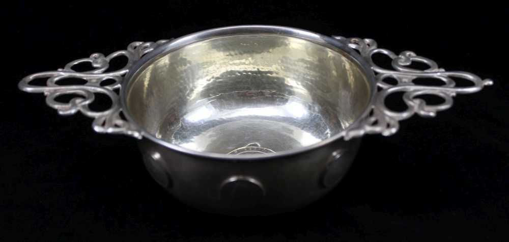 A SUBSTANTIAL WHISKY QUAICH , the silver-plated body inset coins, to the base a 1797 'cartwheel'