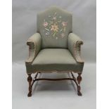 A LATE 19TH CENTURY POSSIBLY PENNSYLVANIAN RE-UPHOLSTERED ARMCHAIR with floral stitched back, with