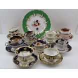 A COLLECTION OF LATE 19TH CENTURY TEA CUPS, trios gilded and painted decorated, together with a