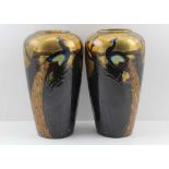 THOMAS FORRESTER & SONS A PAIR OF PHOENIX WARE CERAMIC VASES, glazed and gilded with peacock