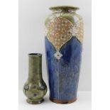 A ROYAL DOULTON STONEWARE VASE of tapering cylindrical form, impressed decoration, tube lined and
