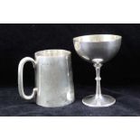 A SILVER CHRISTENING MUG of plain tapering form, London 1933, inscribed, together with a silver