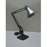 AN EARLY HERBERT TERRY ANGLEPOISE TASK LAMP, with square formed cast iron base and later brushed