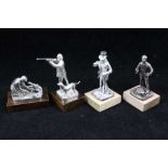 A COLLECTION OF FOUR CAST SILVER SPORTSMEN FIGURES; 'The Shot', 'The Squire', 'Dry Fly' and 'The