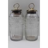 A PAIR OF 18TH CENTURY IRISH CUT GLASS JARS, hobnail bands over facets, ground pontils, fitted