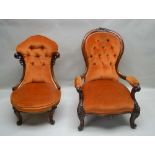 TWO VICTORIAN MAHOGANY FRAMED PARLOUR CHAIRS with burnt orange upholstery, one scrolling carved