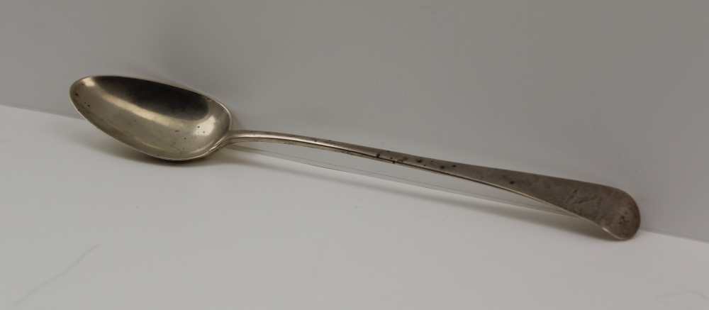 SOLOMAN HOUGHAM A GEORGE III SILVER BASTING SPOON, Old English form, London 1800, engraved with a