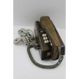 A 20TH CENTURY LEATHER COVERED TRIM PHONE, push-button type, 'Tele.SR 1016A S.T.C. 80/1