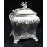 PIERRE GILLIOS AN EARLY GEORGE III SILVER TEA CANNISTER/CADDY of rectangular bombe form, repousse