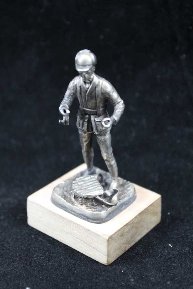 A COLLECTION OF FOUR CAST SILVER SPORTSMEN FIGURES; 'The Shot', 'The Squire', 'Dry Fly' and 'The - Image 4 of 5