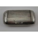 A GEORGE III SILVER CUSHION SHAPED SNUFF BOX all over ribbed exterior & hinged lid, gilded interior,