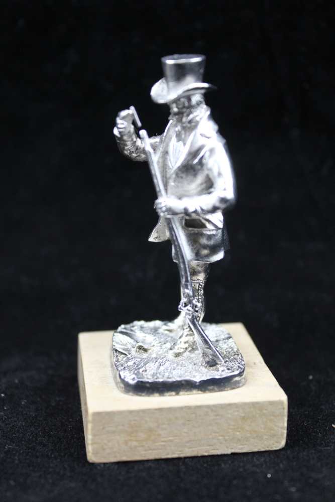 A COLLECTION OF FOUR CAST SILVER SPORTSMEN FIGURES; 'The Shot', 'The Squire', 'Dry Fly' and 'The - Image 3 of 5