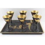 A 20TH CENTURY JAPANESE LACQUER SAKI SET, comprising tray 30cm x 21cm, black ground with gilded