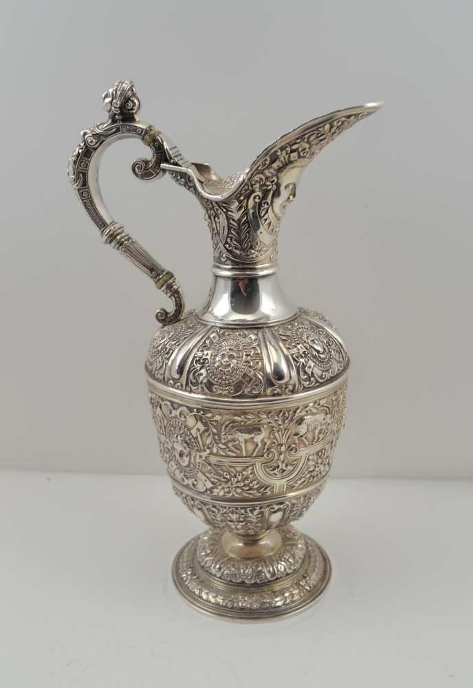 STEPHEN SMITH A VICTORIAN SILVER 'CELLINI' WINE EWER, chased and embossed decoration of mask,