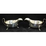 VINERS LTD (Emile Viner) A PAIR OF SILVER GEORGIAN DESIGN SAUCE BOATS, each with hoop handle, raised