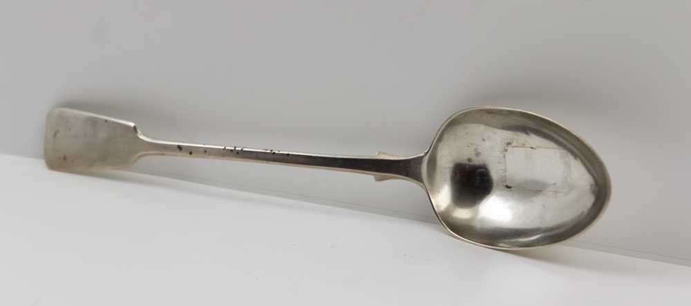 JOSIAH WILLIAMS & CO. A MID 19TH CENTURY SILVER BASTING SPOON, fiddle pattern handle, Exeter 1861,