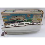 A PENGUIN AVON MODEL MOTOR CRUISER, the plastic moulded boat marked Triang, fitted a motor, 43cm