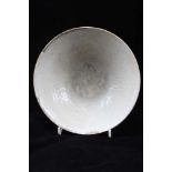 A QINGBAI GLAZED PORCELAIN BOWL, Chinese Southern Sung Dynasty, 12th century, moulded exotic birds &