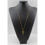 A 9CT GOLD CHAIN stamped .375 together with a yellow metal CROSS PENDANT, possibly Italian,