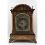 A 'LENZKIRCH' ROSEWOOD CASED MANTEL CLOCK, marquetry inlaid, with cast metal finials and acanthus