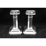 JAMES DEAKIN & SONS A PAIR OF SILVER CANDLESTICKS, octagonal stems on square stepped bases with