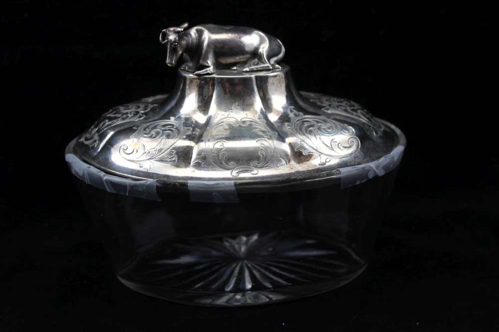 HAWKESWORTH, EYRE & CO. A MID 19TH CENTURY SILVER LIDDED GLASS BUTTER DISH, the cover with cow