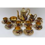 A ROYAL WORCESTER FRUIT HAND-PAINTED CHINA COFFEE SERVICE, comprising; coffee pot, milk jug, sugar